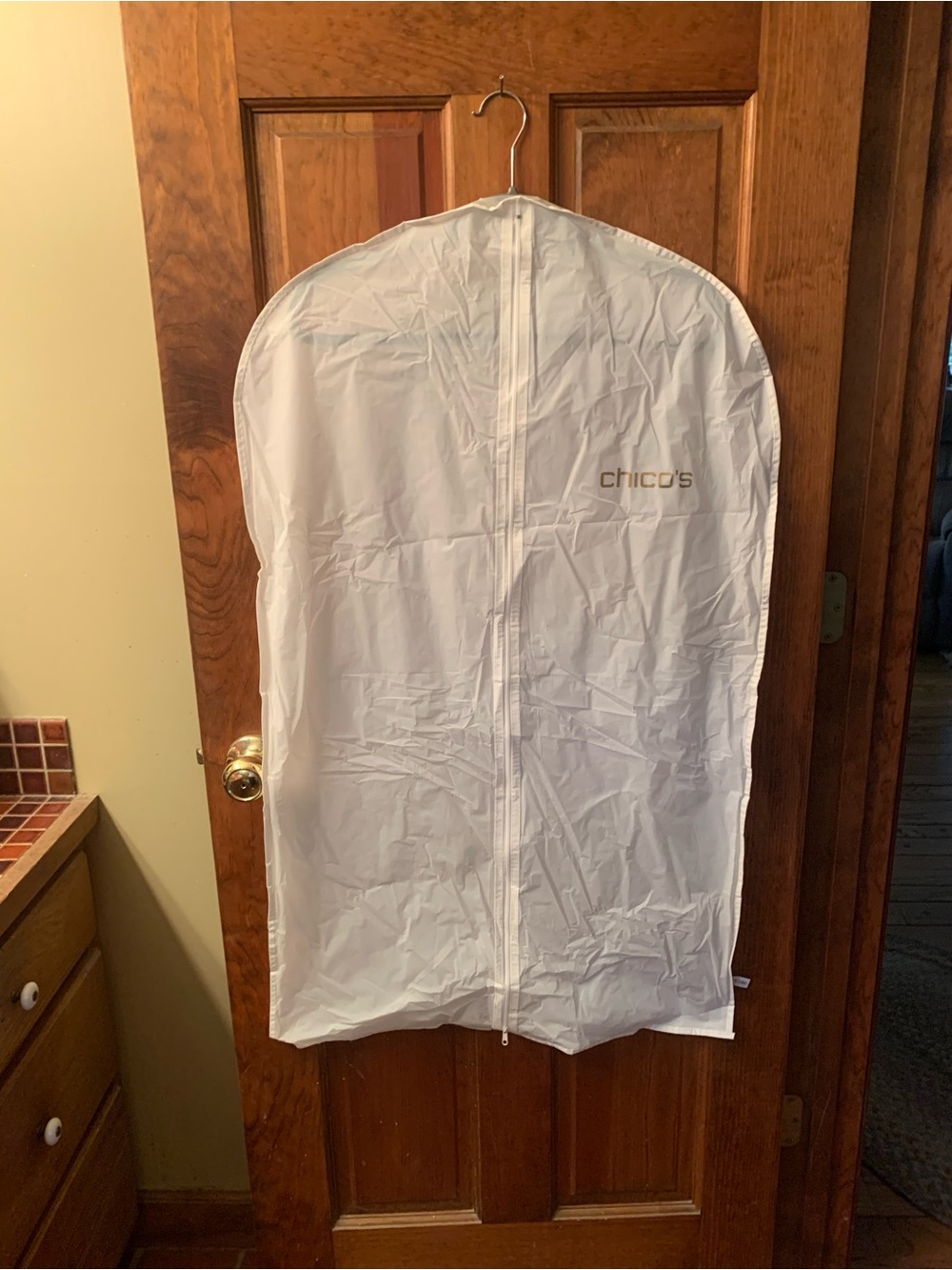 3 CHICO WHITE zip garment bags, 3 sold as 1 set. 24 inches wide and 40 long.